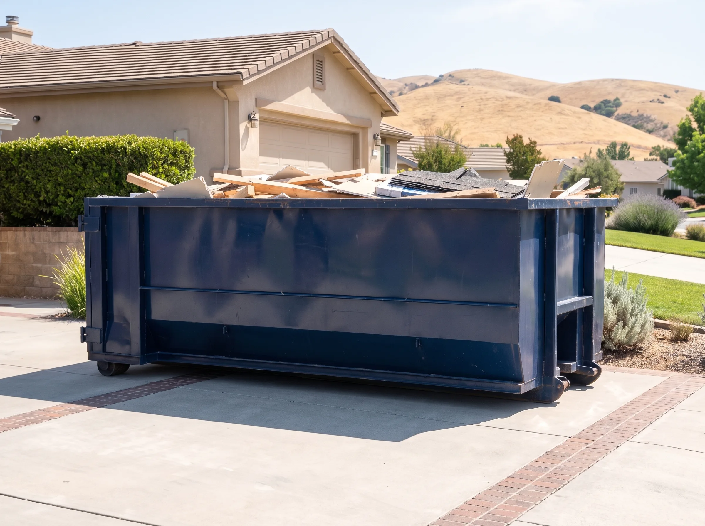 Roll-off dumpster being loaded in Orange County, CA